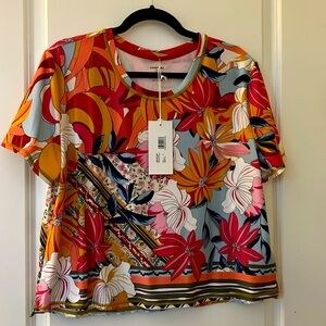 Johnny Was  Active large Rachel May step hem tee. ￼